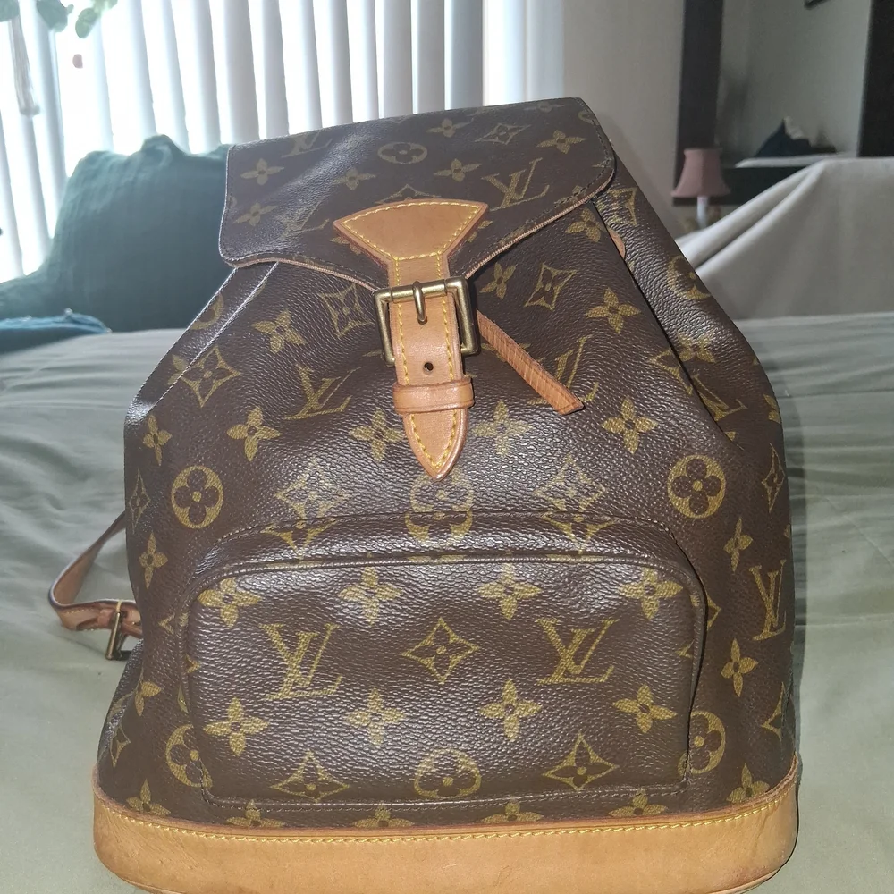Louis Vuitton Brown and Tan Monogram Backpack - Picture 1 of 9